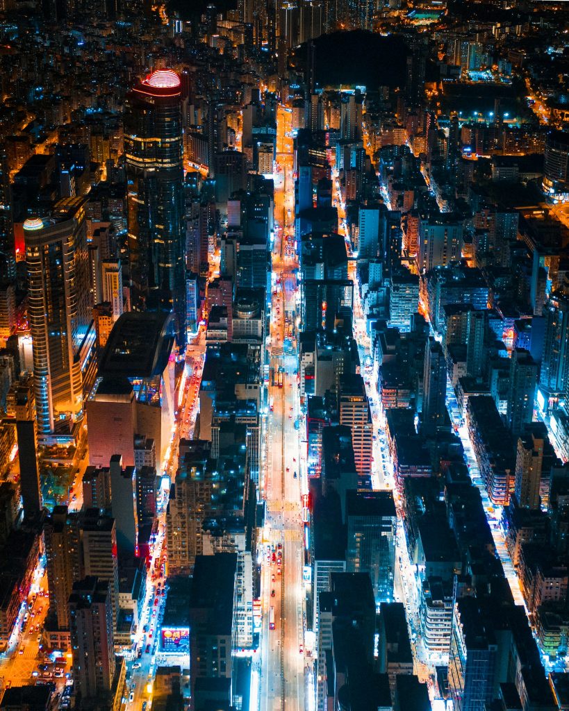 An aerial view of a bustling city at night